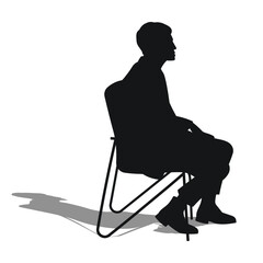 Profile of a man, sitting on a soft chair, listening, black silhouette