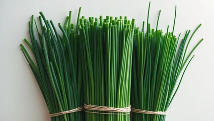Fototapeta premium Garlic chives displayed against a background backdrop