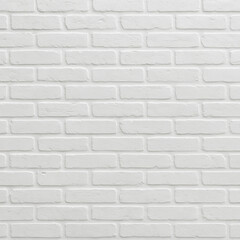 Naklejka premium White brick wall provides a clean and textured surface