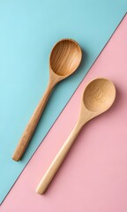 Two Wooden Spoons on Pastel Blue and Pink Background &ndash; Minimal Kitchen Utensil Flat Lay

