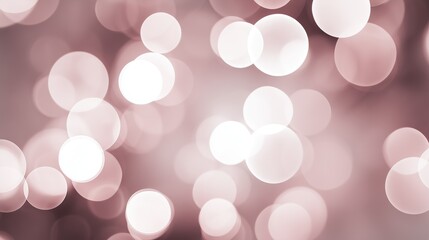 Abstract bokeh lights with soft dreamy feel and gentle pink toned color palette
