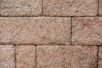 stone wall natural textured, brick shape stones constuction surface background