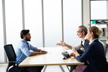 Human resources : company, successful deal. Human resources manager interviewing applicant at...