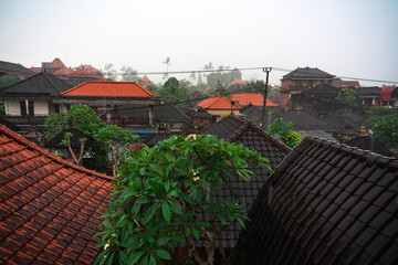 Discover the vibrant rooftops of Ubud, Bali on a warm, rainy summer day