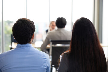 Back view, rear view audience or crowd people : Asian indian business man and diverse audience people company employees in meeting conference room