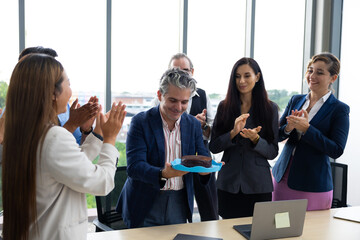 happy birthday party : Business Hispanic man celebrating birthday and doing a party with colleagues. Multi-Ethnic Coworkers are Celebrating a Birthday Party in the Office.