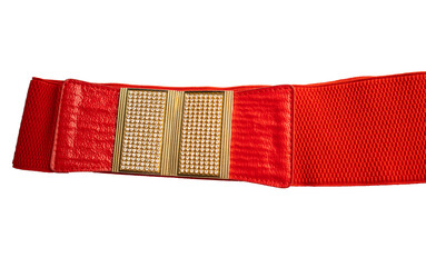 Red fashionable women's knitted elastic band belt with metal buckle with rhinestones, isolated on white background