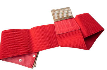 Red fashionable women's knitted elastic band belt with metal buckle with rhinestones, isolated on white background