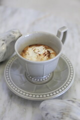 Hot coffee cup with cream