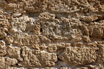 Stone wall background texture. Historic architectural texture ideal for backgrounds, heritage restoration projects, archaeology themes, medieval structures and construction materials 