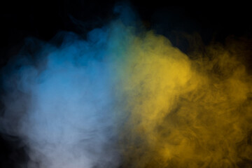 Yellow steam on a black background.