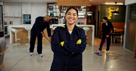 Woman, portrait and janitor with smile for maintenance job, hygiene and arms crossed with team in...