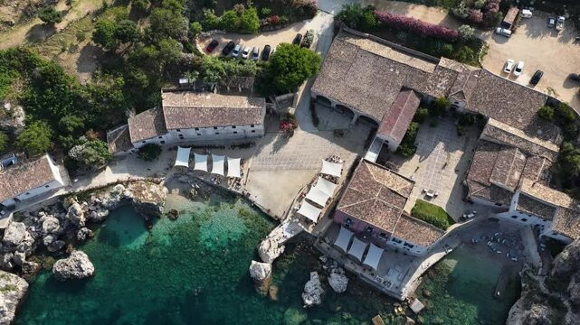 Il mare della Sicilia, Italia. Tonnara di Scopello. 4K
Vista aerea della costa pi&ugrave; bella della Sicilia. La baia di Scopello, tra Palermo e San Vito Lo Capo. Riserva dello Zingaro. 