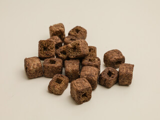 Chocolate crunchy snacks on white background
