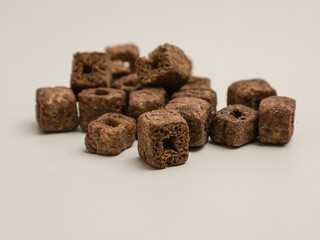 Chocolate crunchy snacks on white background