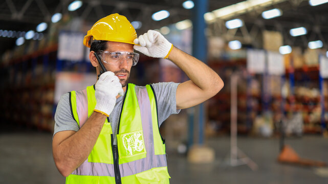 Factory worker, industrial occupation man working in storage warehouse, business male in logistic storehouse factory for a job of goods box shipping, stock delivery distribution industry to global