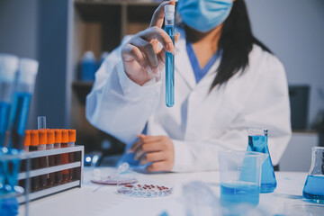 Research, experiment and medical trial being done by a scientist in a lab, science facility or...