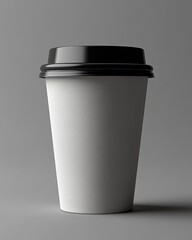Blank white paper coffee cup with black lid