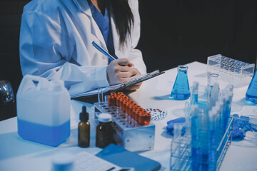 Research, experiment and medical trial being done by a scientist in a lab, science facility or...
