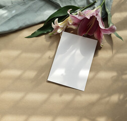 Card mockup real hand crafted photo lily botanical napkin brown background natural shadow overlay