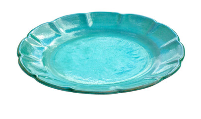 Empty teal ceramic plate with scalloped edge on white background