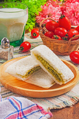 Matcha butter cream with white chocolate chip toast on wooden plate 