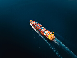 shipping logistic cargo container ship carrying in black sea import export goods and distributing...
