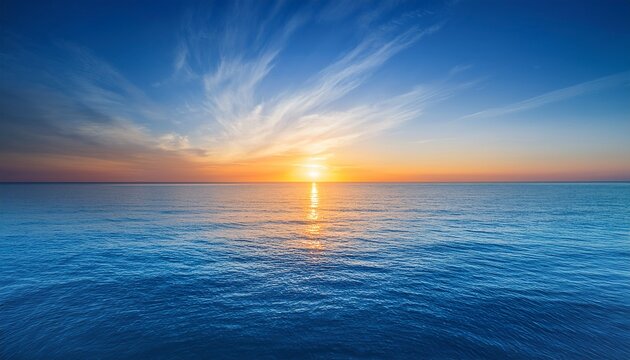 beautiful sunset with blue sea and sky peaceful background long