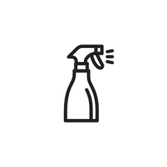 Spray bottle sprays liquid in clean white backdrop detail