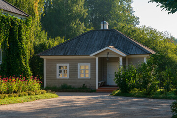 View of the kitchen building on the territory of the Mikhailovskoye estate of the Pushkin...
