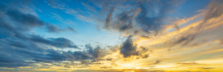 Rain clouds and evening sky,Amazing sunset skyscape. Evening sky with bright colorful orange and...