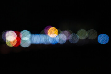 Bright colorful bokeh circles, abstract blurred background. Soft bokeh with iridescent circles,...