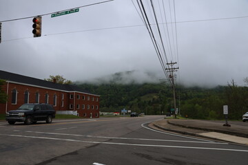 Rural scenery from the highway on a cloudy day.