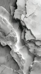 Marble texture with streaks and layers showing the natural beauty of stone formations in grayscale