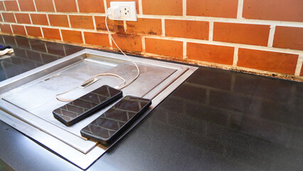 Phone charging on the dirt sink