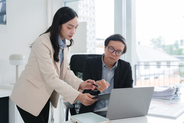 Business Colleagues Discussing Work in Office
