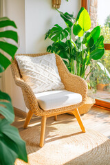 Wicker, Rattan Boho Chair on Cozy Patio, Terrace with Potted Plants, White Cushions, Outdoor Minimalist Setup in Summer Mood, Garden Corner Retreat.