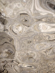 Uneven glass surface. Glass background with irregularities