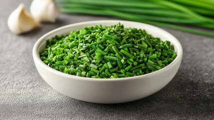 Fresh chopped chives in a white bowl