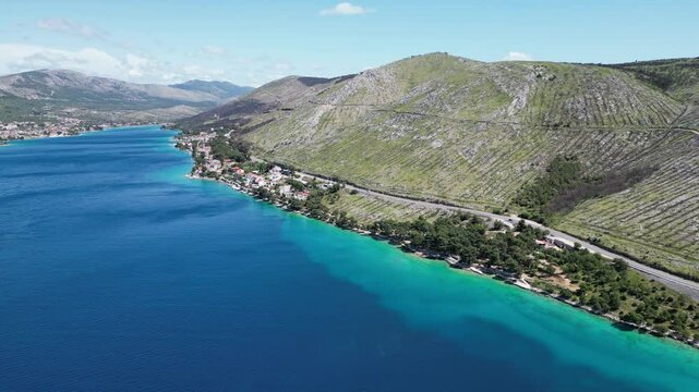 Aerial view of the Croatian coast with small campsites in the bay of Greba&scaron;tica close to Primosten in Dalmatia