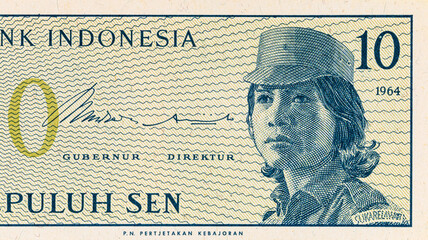 Fragment of a 10 sen banknote of Indonesia, 1964. Indonesian money. © Sergii