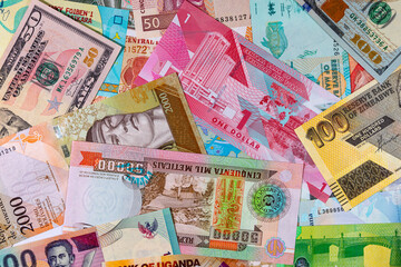 Paper and polymer money of different countries. Money background.