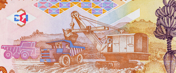 1000 Guinean Francs with the image of Bauxite mining by open pit method. African Guinean money close-up