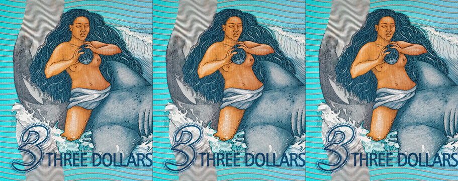 3 Dollars Banknote of the Cook Islands with the image of Figurine, Ina and the Shark . Polymer money of the Cook Islands