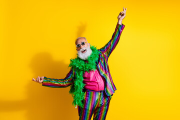 Photo of cheerful funky pensioner wear stylish striped vivid suit dance club theme party isolated...