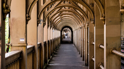 Perspective of a covered walkway disappearing into the distance in Newcastle upon Tyne, England