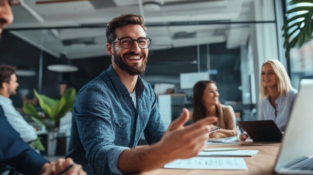 A tech consultant demonstrating a cloud-based platform to small business owners in a relaxed office environment