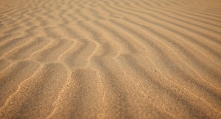 A tower of powdered donuts with a bite taken out of the top donut on a wooden cutting board