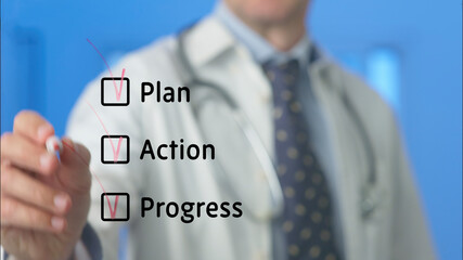 Doctor is drawing check marks on a transparent virtual screen with his fingers, ticking off plan,...