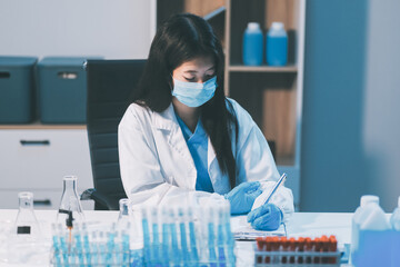 Research, experiment and medical trial being done by a scientist in a lab, science facility or...